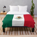 Mexican flag plush blanket with green, white, and red colors, and an eagle design