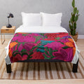 Colorful embroidered Mexican-style plush blanket with floral designs