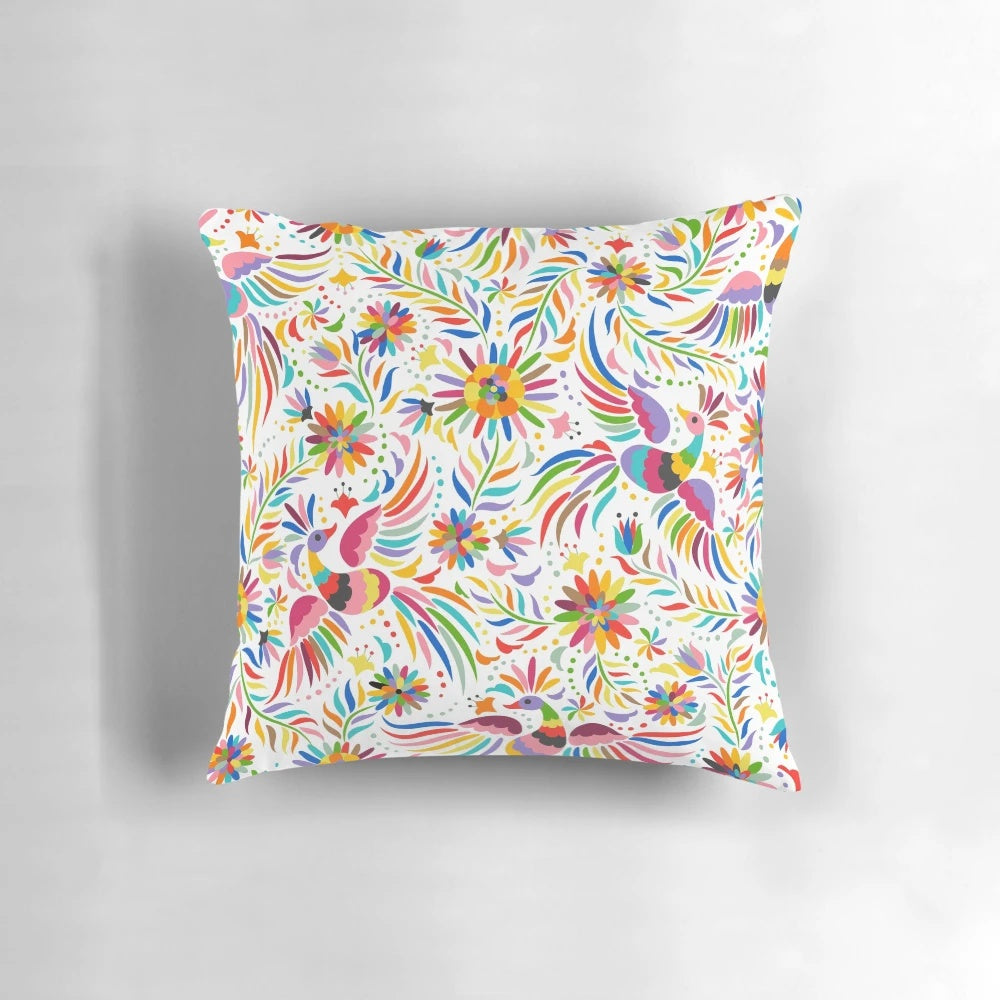 Colorful throw pillow featuring a seamless, ornate Mexican-inspired pattern with birds and floral elements.