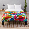Colorful Mexican-inspired otomi pattern plush blanket