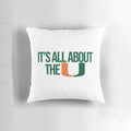 Colorful orange, green, and white miami Pillow with "canes" and "hurricanes" text