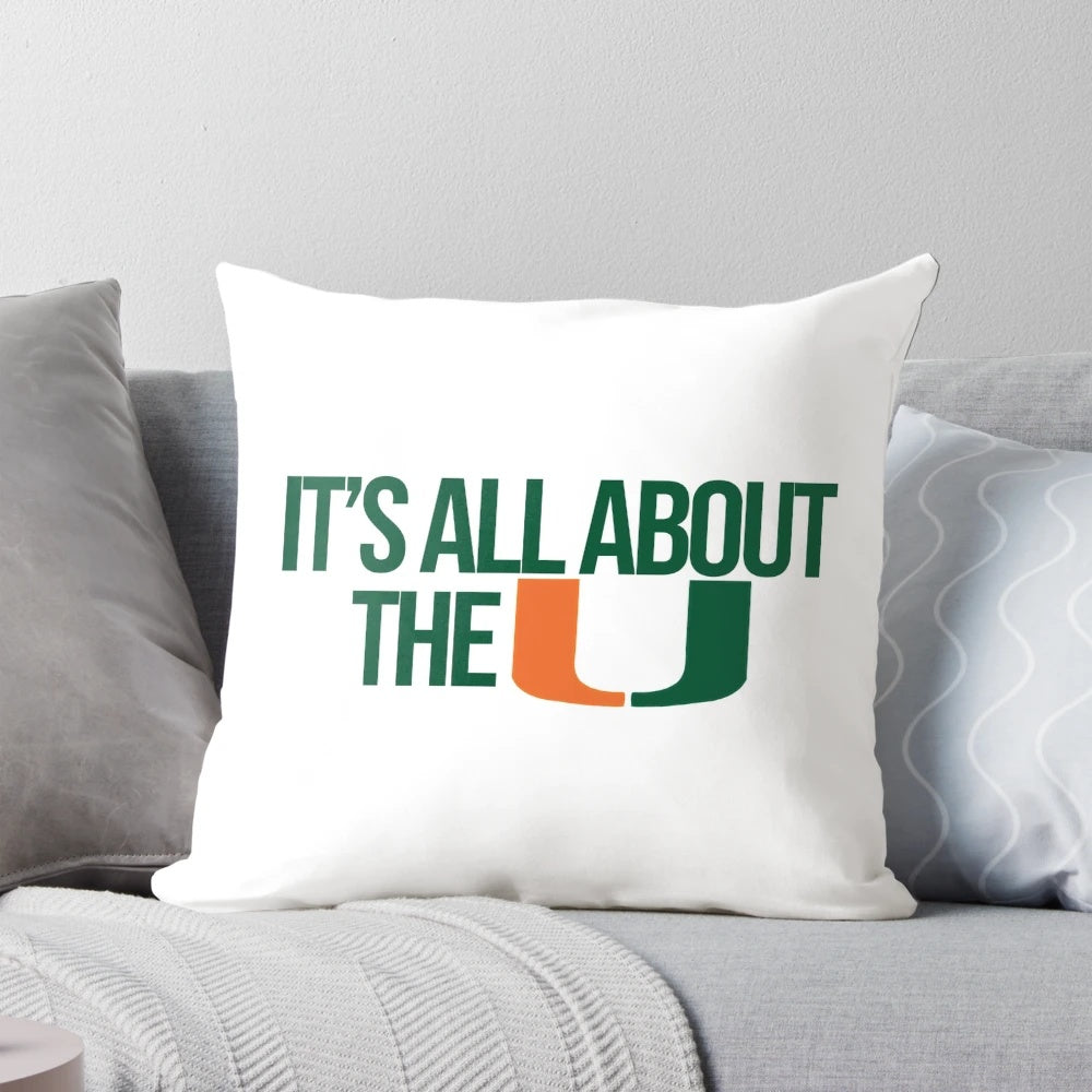 Colorful orange, green, and white miami Pillow with "canes" and "hurricanes" text