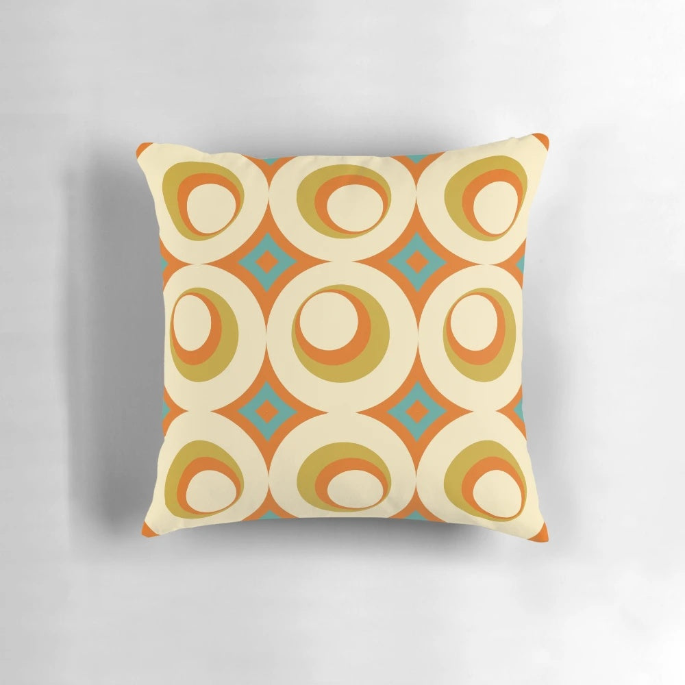 Mid-century modern style orange throw pillow with geometric pattern