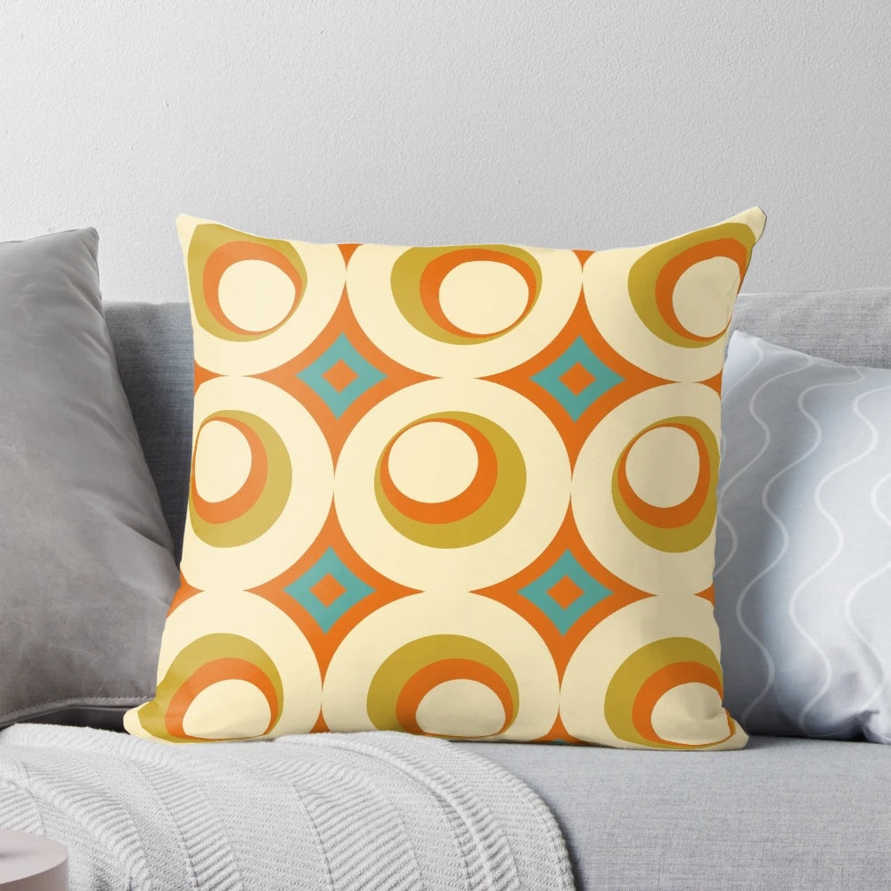 Mid-century modern style orange throw pillow with geometric pattern