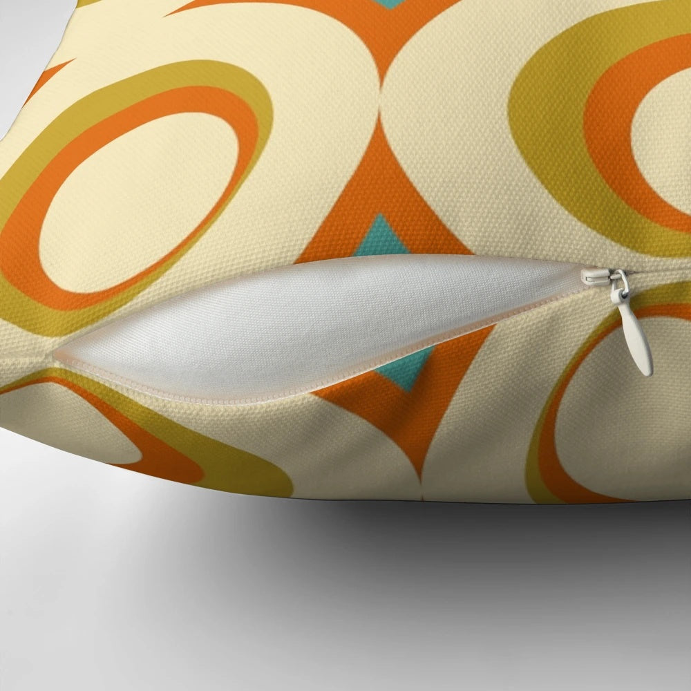 Mid-century modern style orange throw pillow with geometric pattern