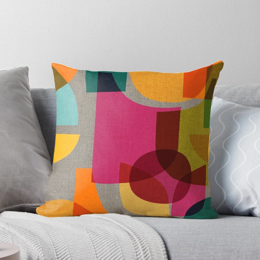 Vibrant multi-colored mid-century modern kaleidoscope pattern pillow for stylish home decor