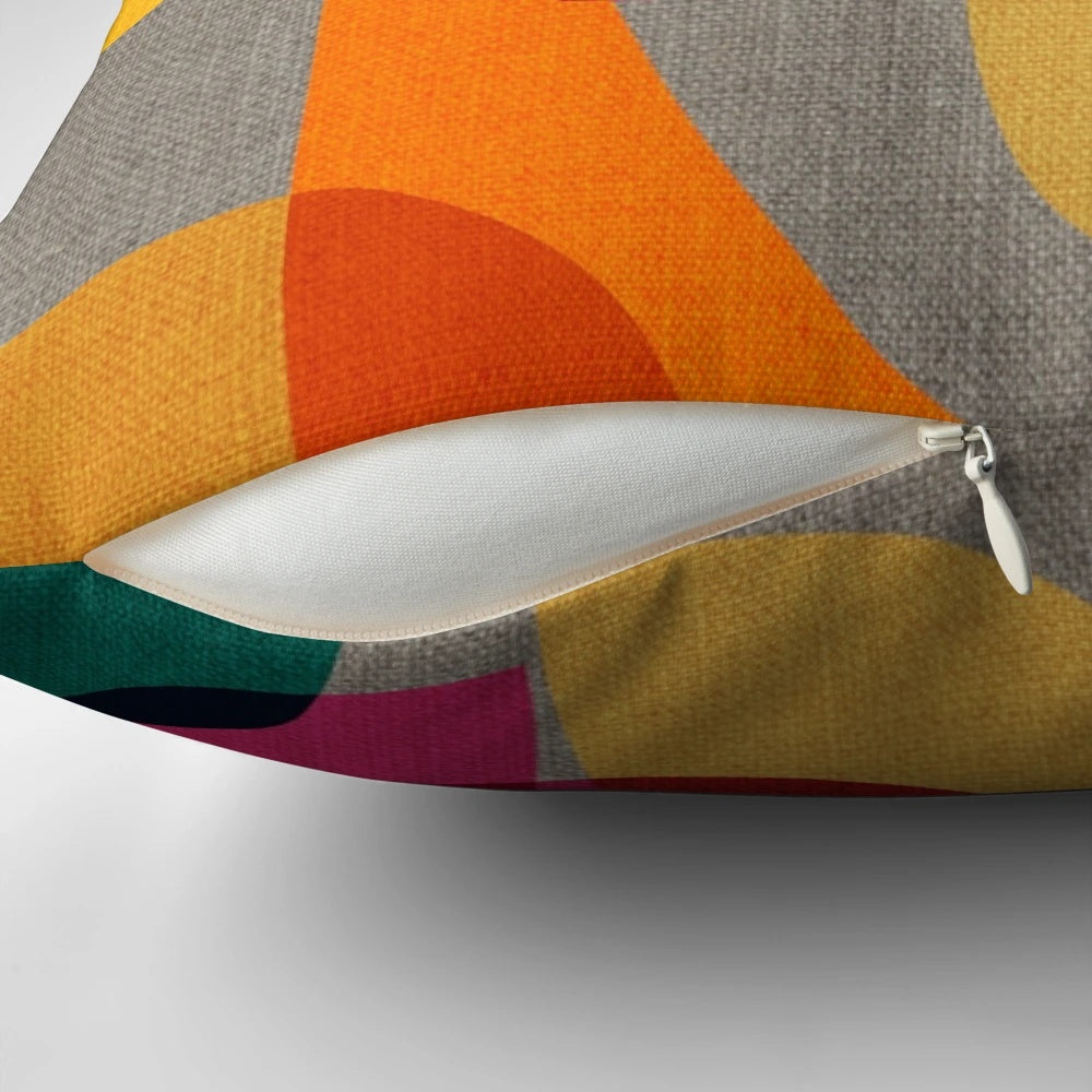 Vibrant multi-colored mid-century modern kaleidoscope pattern pillow for stylish home decor
