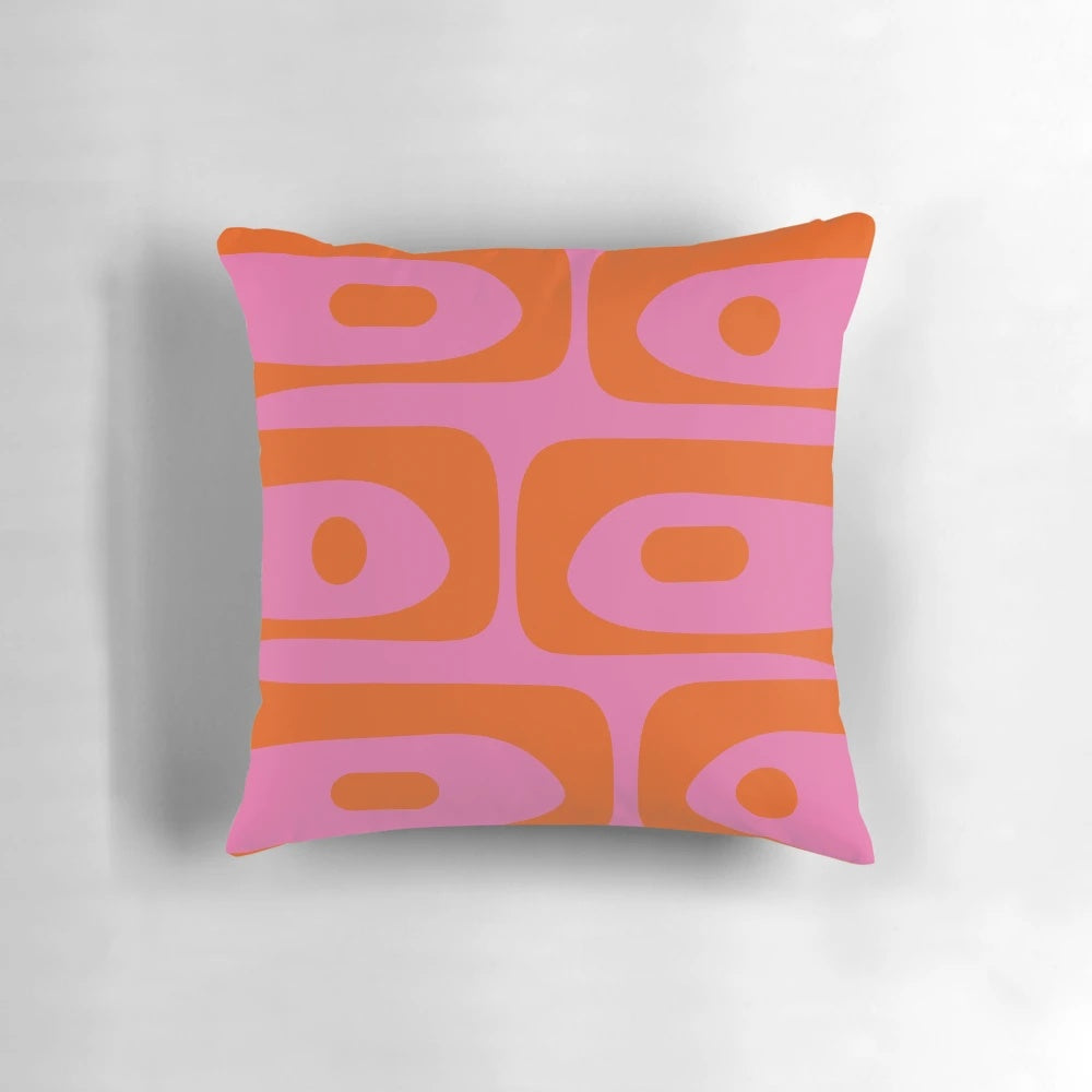 Colorful mid-century modern style abstract pattern throw pillow in pink and orange hues