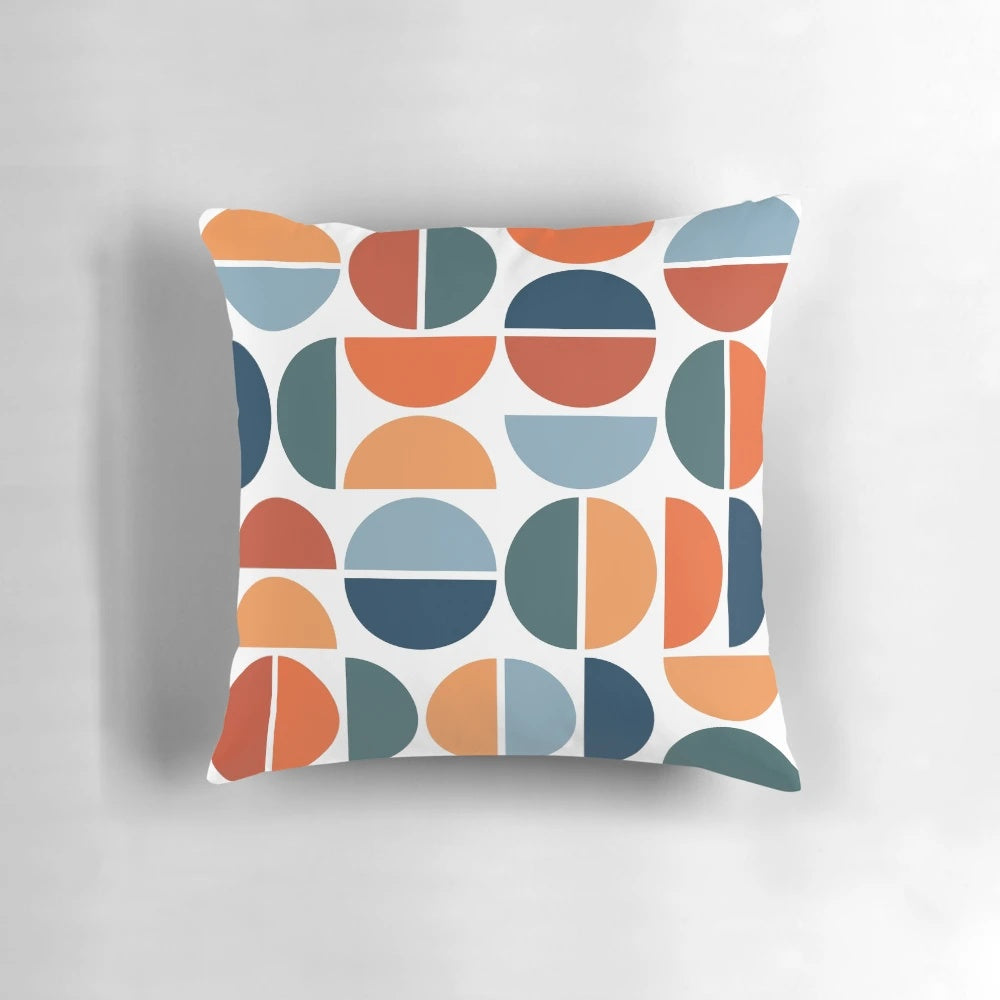 Colorful mid-century modern inspired throw pillow with geometric pattern