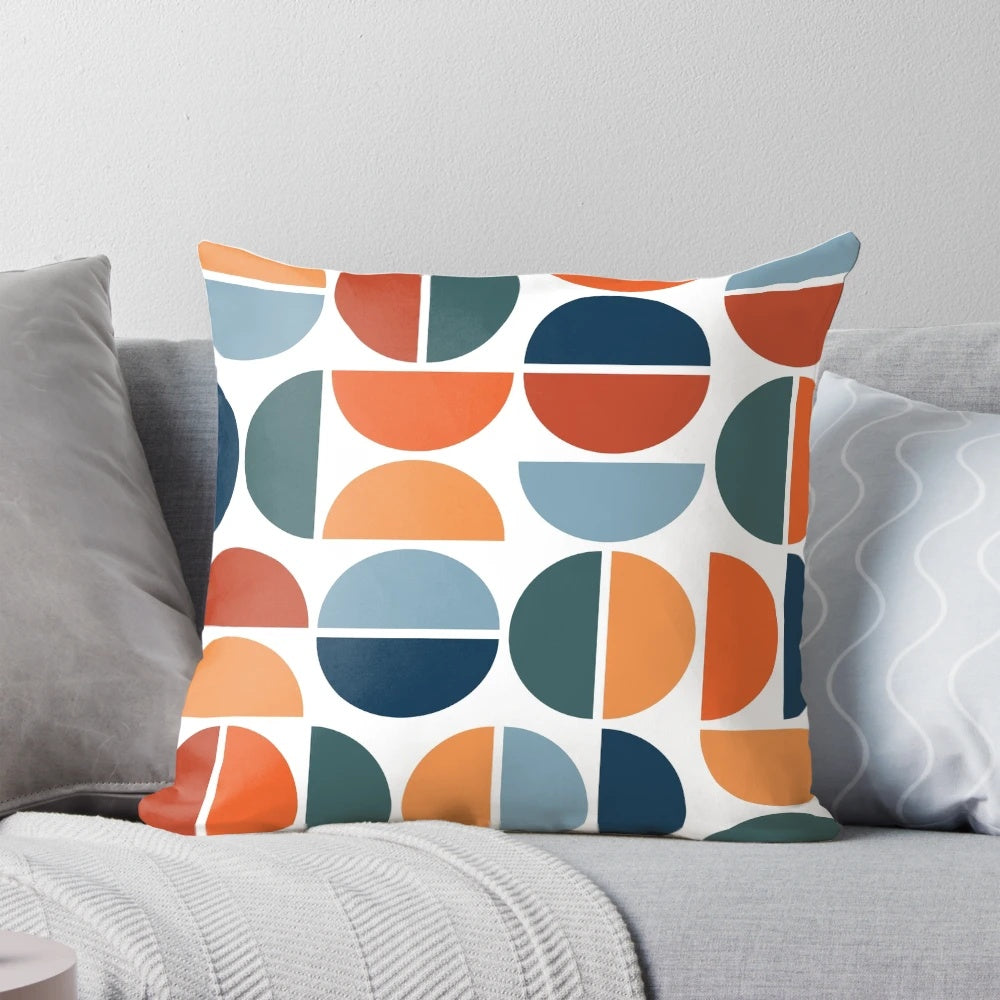 Colorful mid-century modern inspired throw pillow with geometric pattern