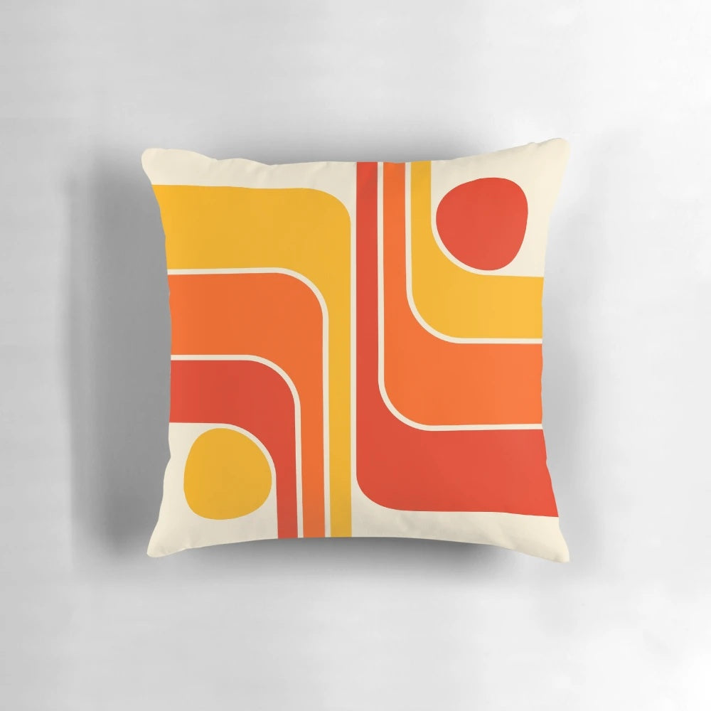 Retro geometric design throw pillow in red, orange, yellow, and beige colors