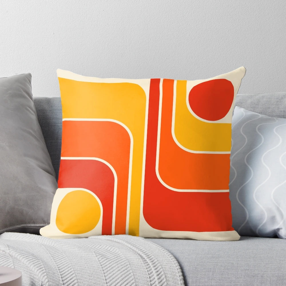 Retro geometric design throw pillow in red, orange, yellow, and beige colors
