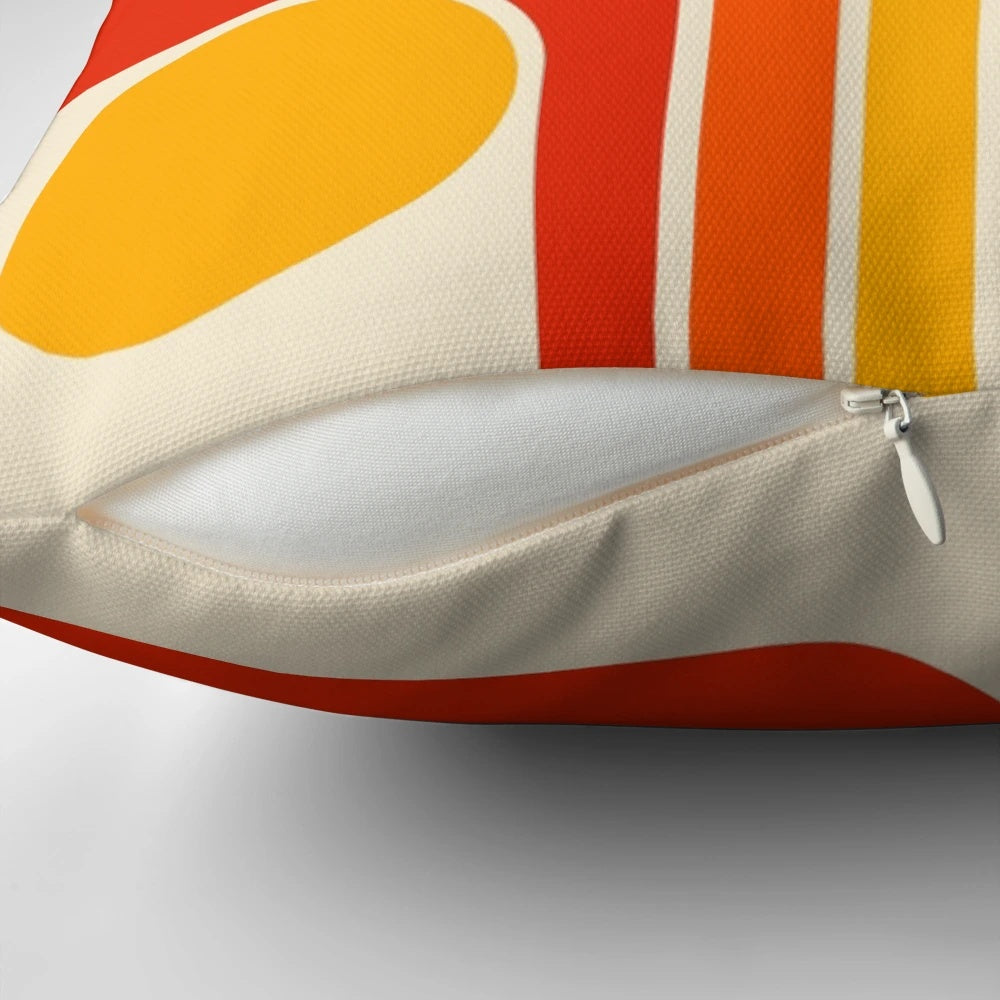 Retro geometric design throw pillow in red, orange, yellow, and beige colors