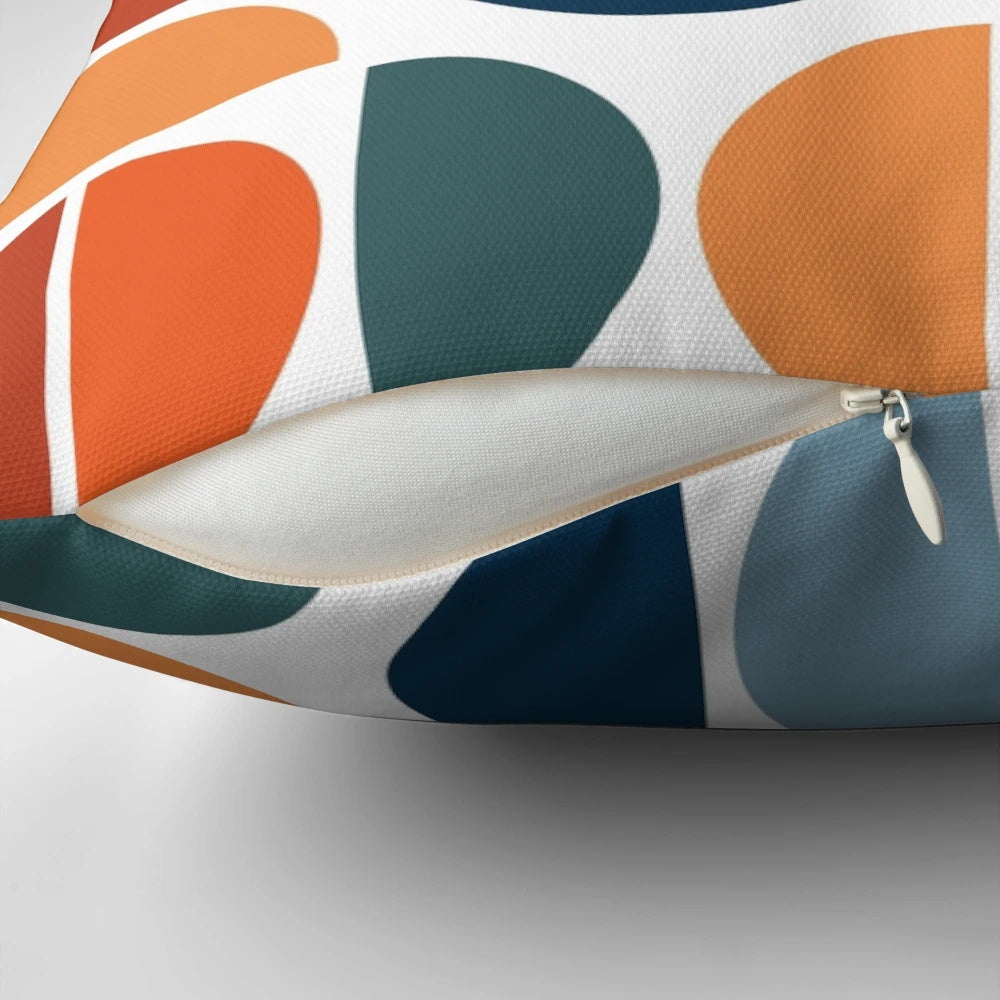 Colorful mid-century modern inspired throw pillow with geometric pattern
