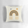 Mid-century modern pillow featuring a stylized sun and moon design in a geometric, abstract pattern.