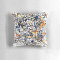 Colorful splatter art pillow inspired by the iconic paintings of Jackson Pollock