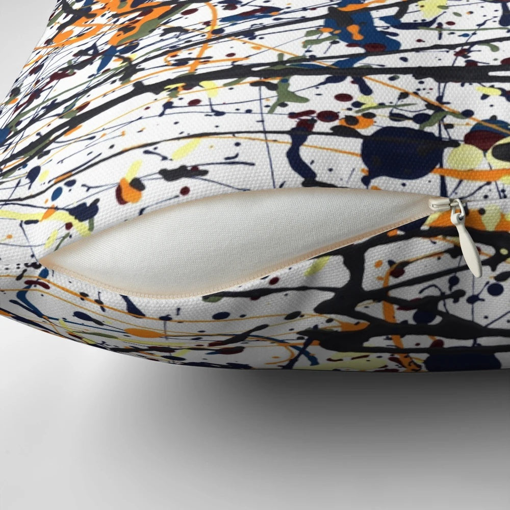 Colorful splatter art pillow inspired by the iconic paintings of Jackson Pollock