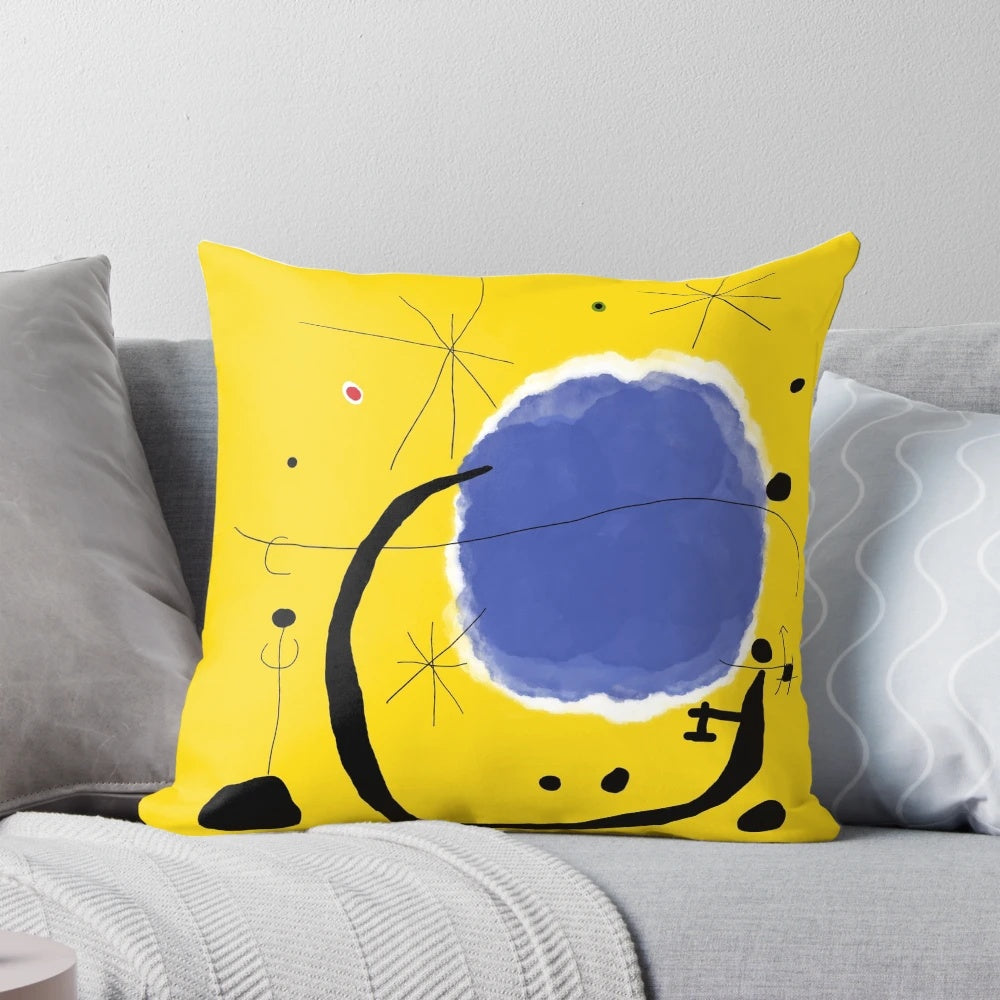 Colorful abstract geometric throw pillow design inspired by the artwork of famous surrealist artist Joan Miro