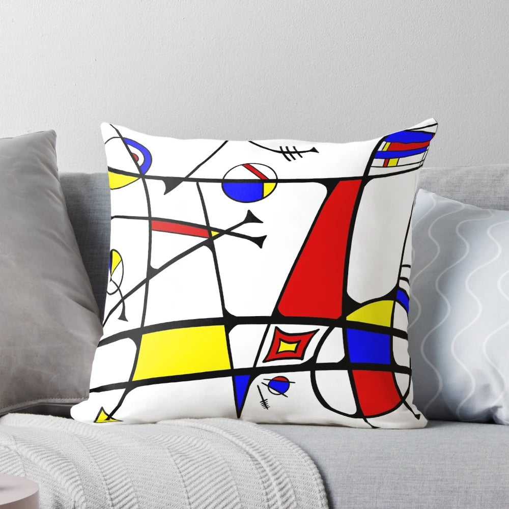Colorful abstract art pillow with primary colors, inspired by the style of artist Joan Miro