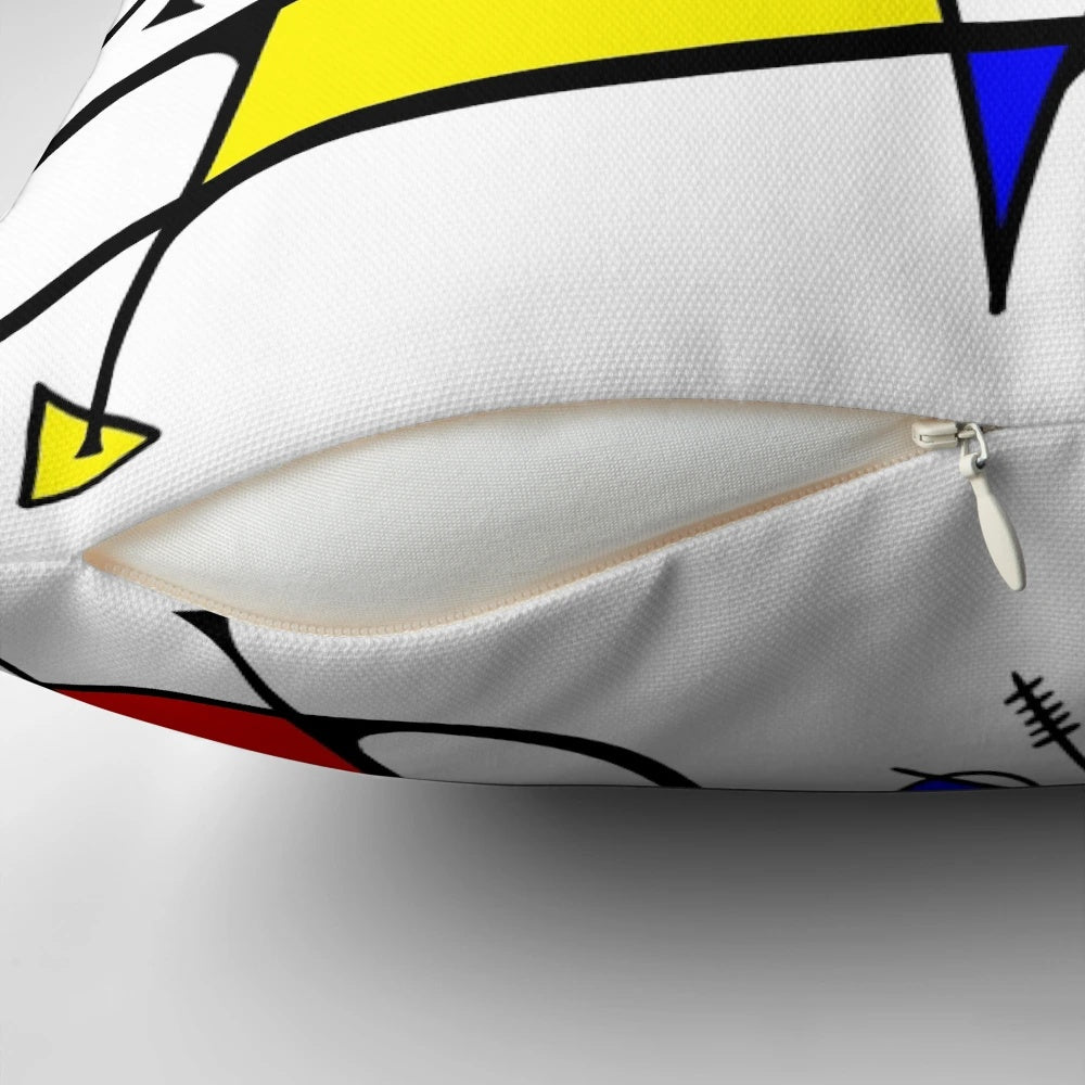 Colorful abstract art pillow with primary colors, inspired by the style of artist Joan Miro