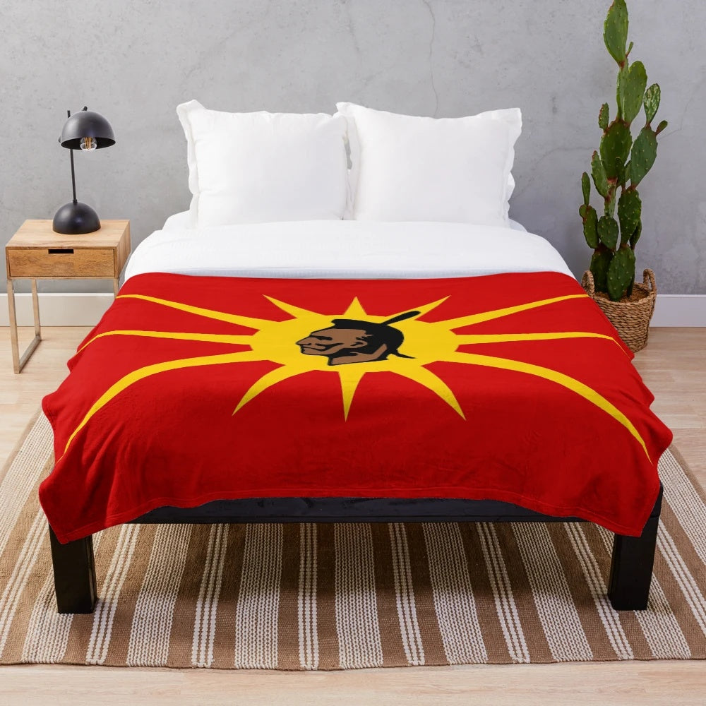 Mohawk-inspired plush blanket with vibrant red and yellow colors