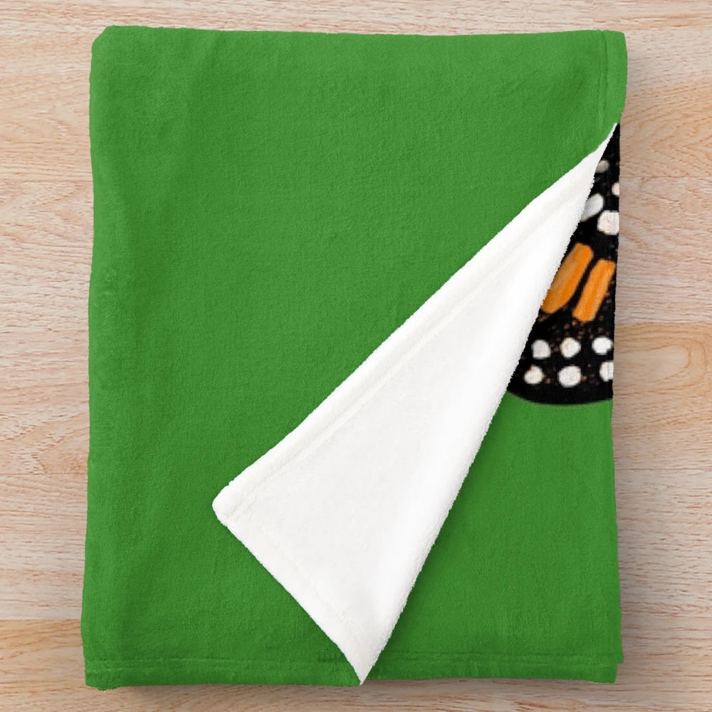 Soft, plush blanket with a colorful monarch butterfly print design