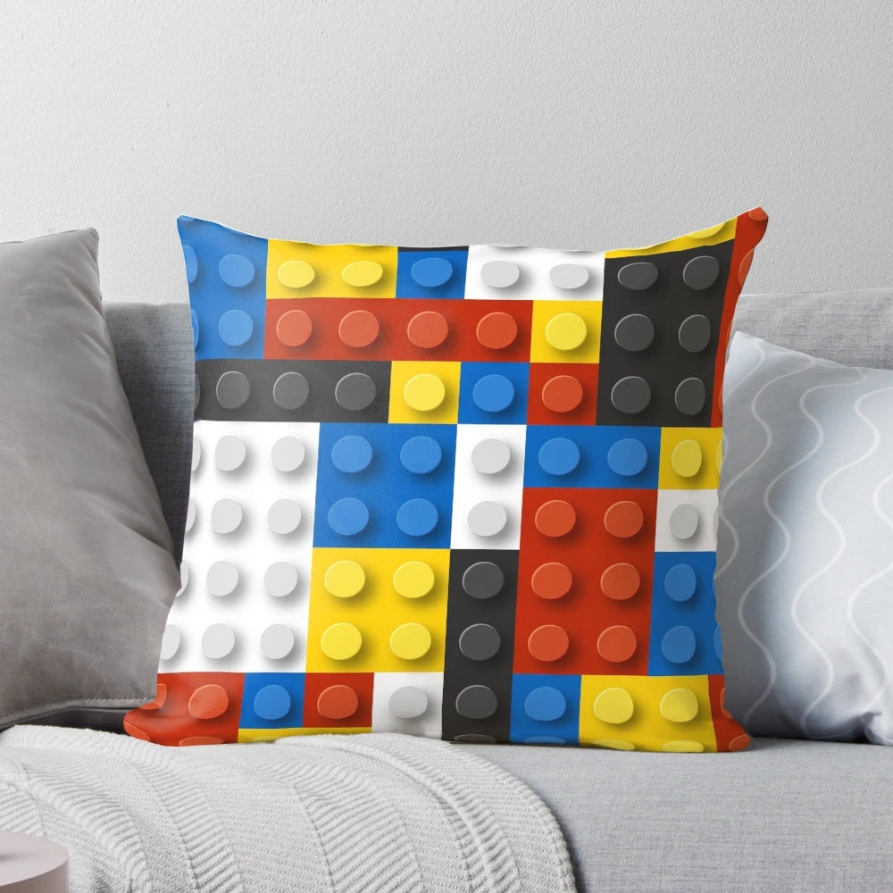 Colorful Mondrian-inspired geometric throw pillow with bold red, blue, and yellow blocks