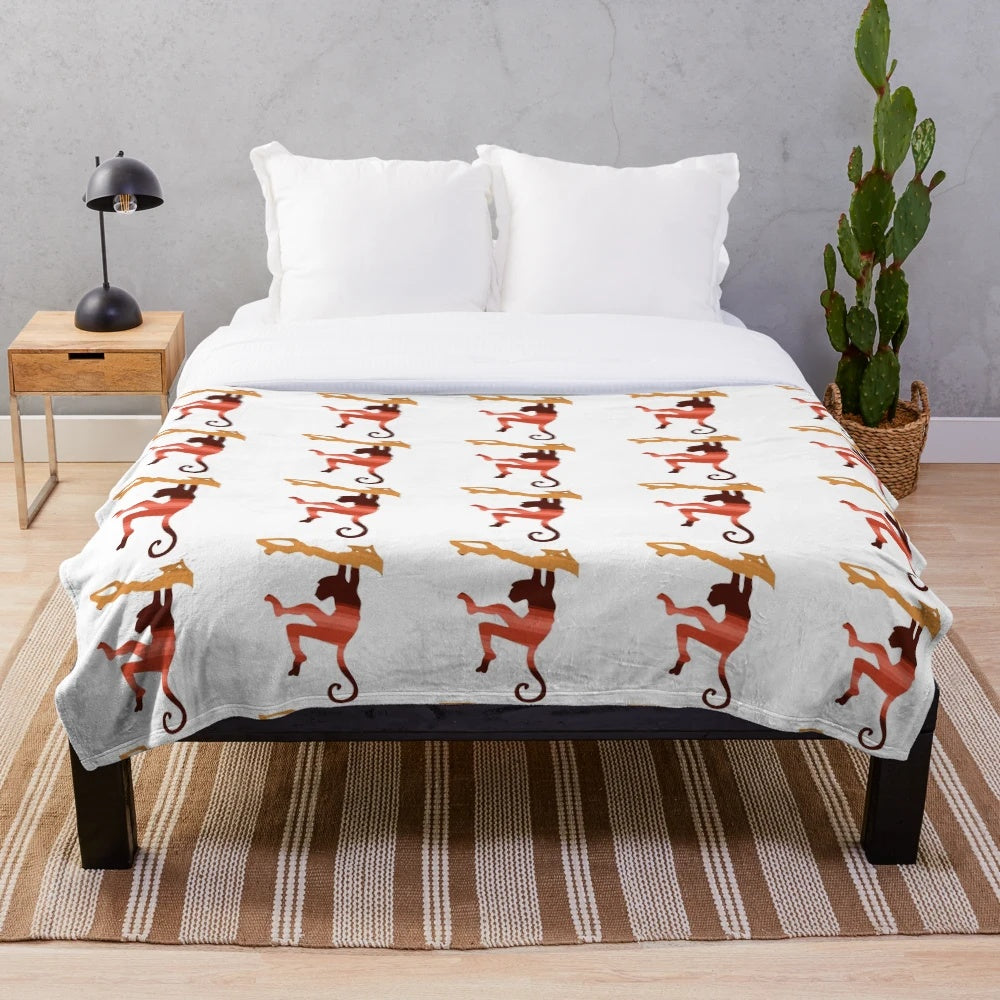 Vibrant and colorful monkey-themed plush blanket with abstract legendary animal design