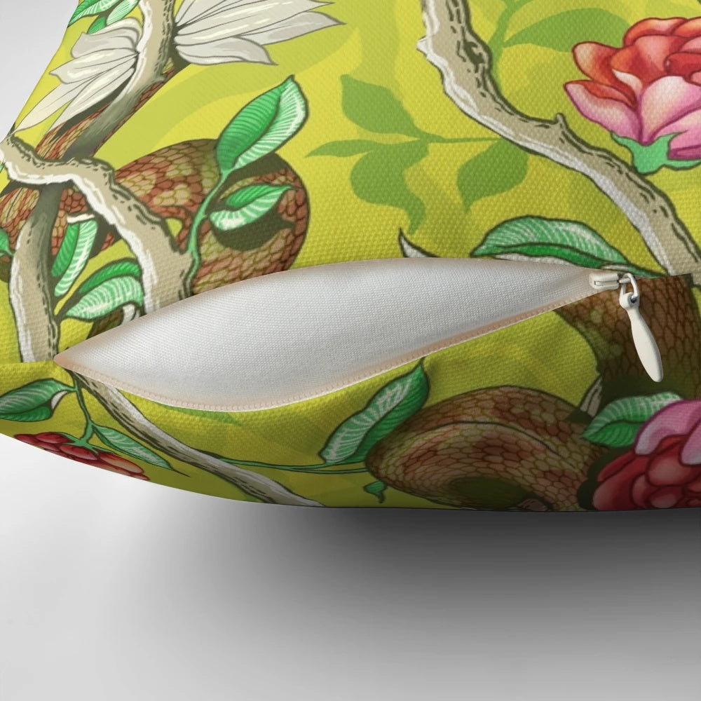 Colorful mustard-colored pillow with a vibrant floral and snake pattern, perfect for adding a touch of nature to your home.