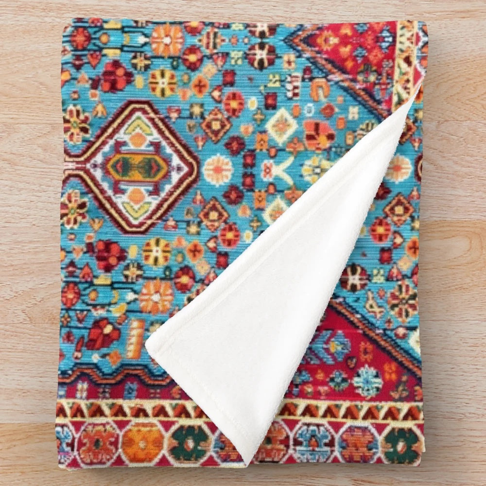 Colorful, Moroccan-style plush blanket with traditional patterns