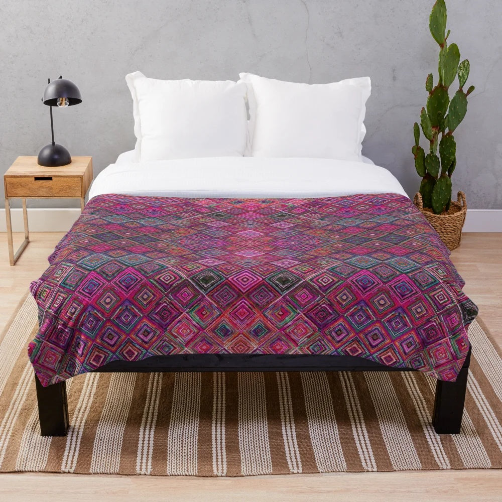 Colorful Moroccan-style plush blanket with intricate patterns