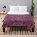 Colorful Moroccan-style plush blanket with intricate patterns