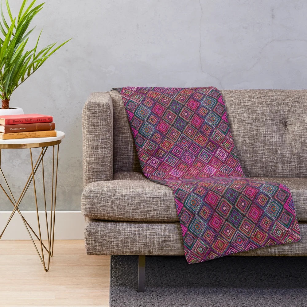 Colorful Moroccan-style plush blanket with intricate patterns