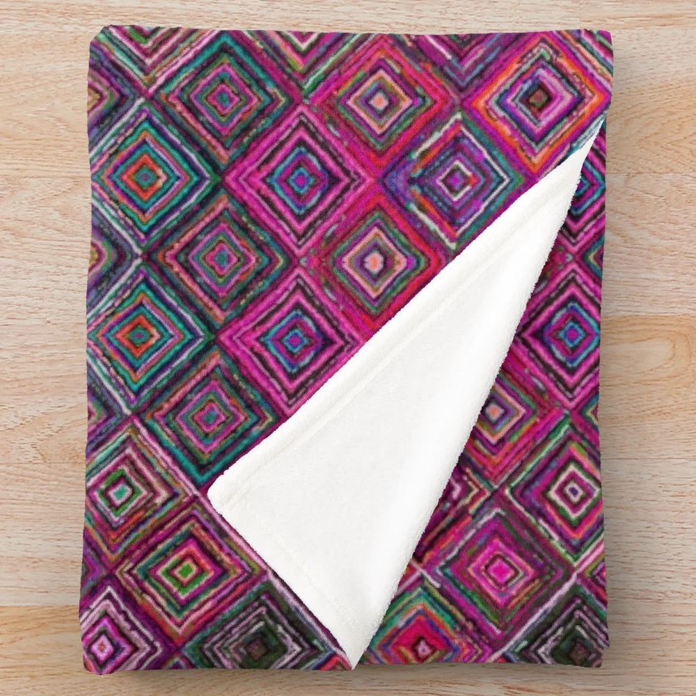 Colorful Moroccan-style plush blanket with intricate patterns