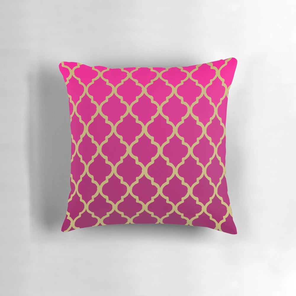 Decorative throw pillow featuring a beautiful Moroccan pattern in shades of pink and gold.