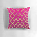 Decorative throw pillow featuring a beautiful Moroccan pattern in shades of pink and gold.
