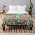 Colorful geometric pattern plush blanket with Moroccan-inspired stained glass tile design