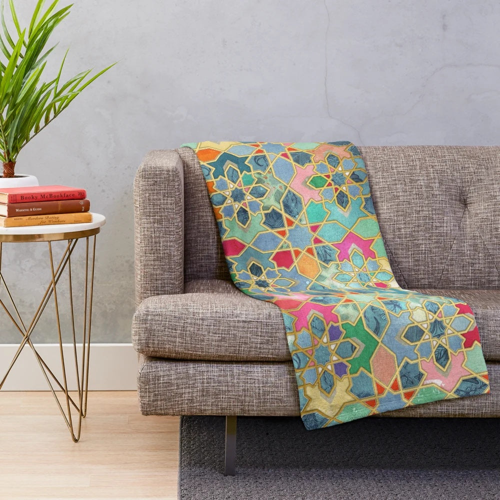Colorful geometric pattern plush blanket with Moroccan-inspired stained glass tile design