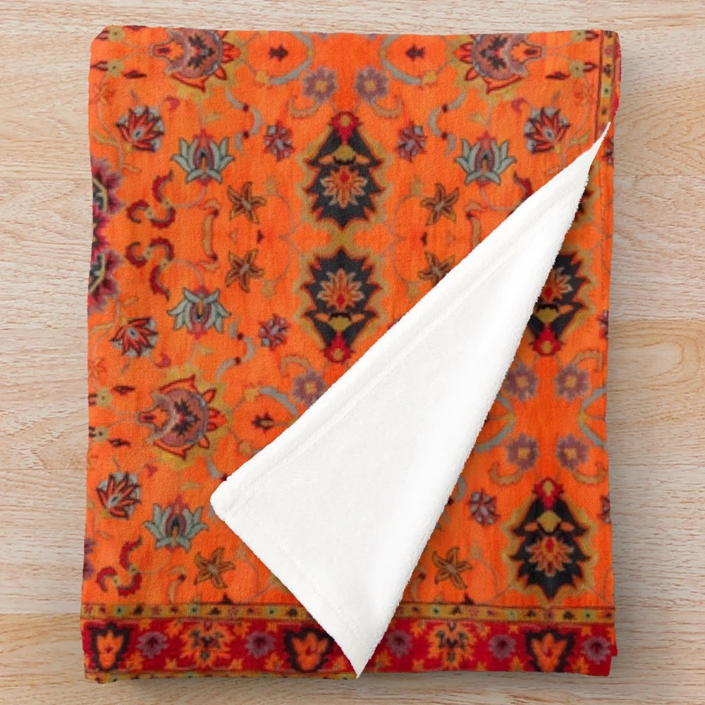 Vibrant Moroccan sunset-inspired plush blanket with bohemian tapestry design