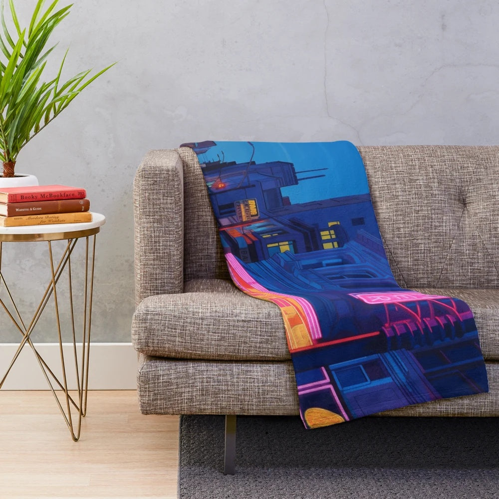 Vibrant pink and violet plush blanket with retro movie theater design