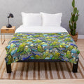 Multicolored plush blanket featuring a colorful budgie pattern design