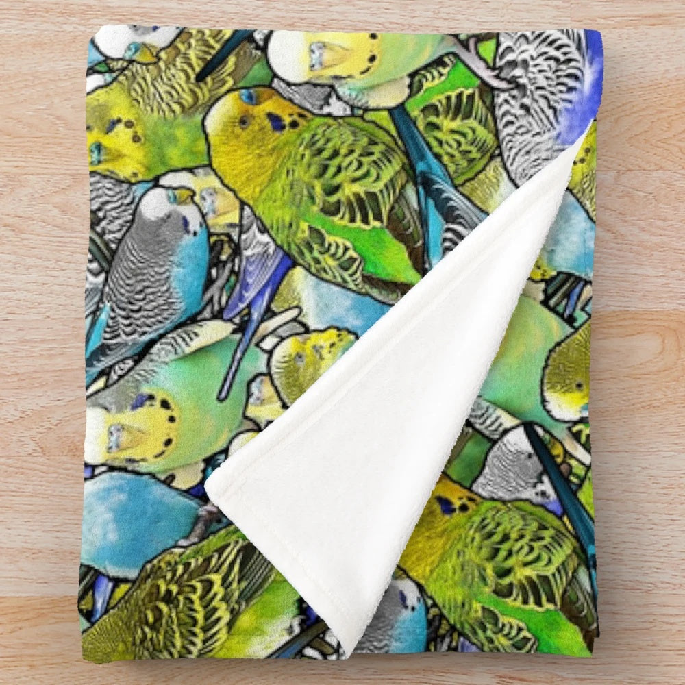 Multicolored plush blanket featuring a colorful budgie pattern design