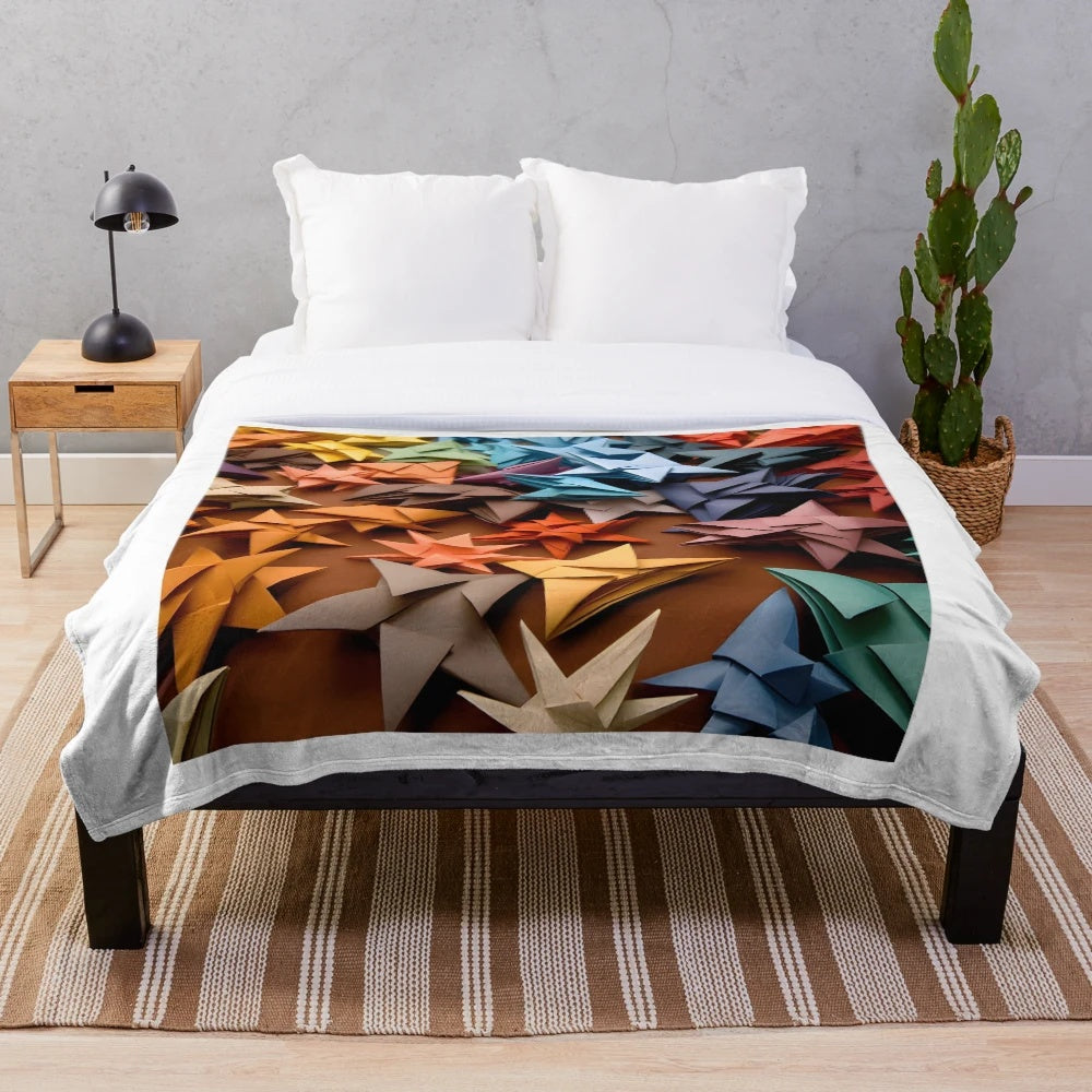 Multicolored paper star patterned plush blanket
