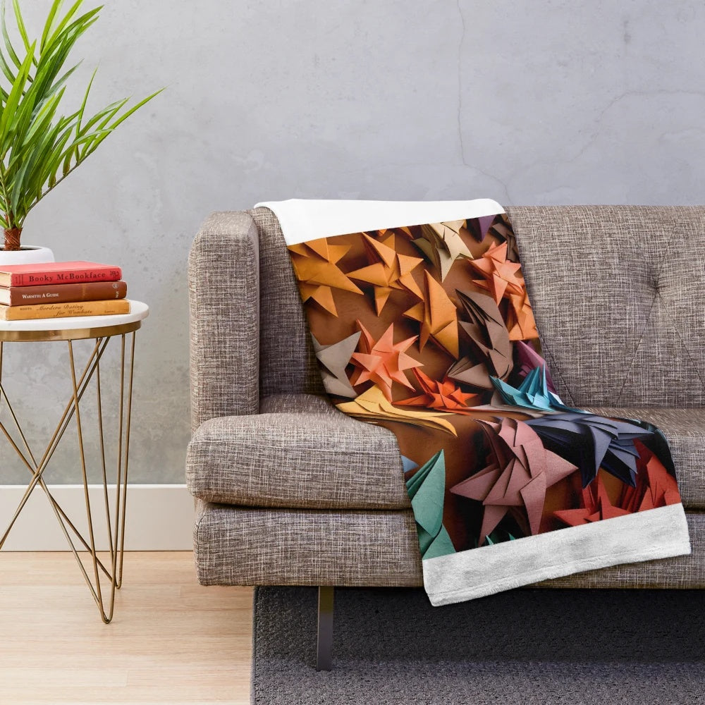 Multicolored paper star patterned plush blanket