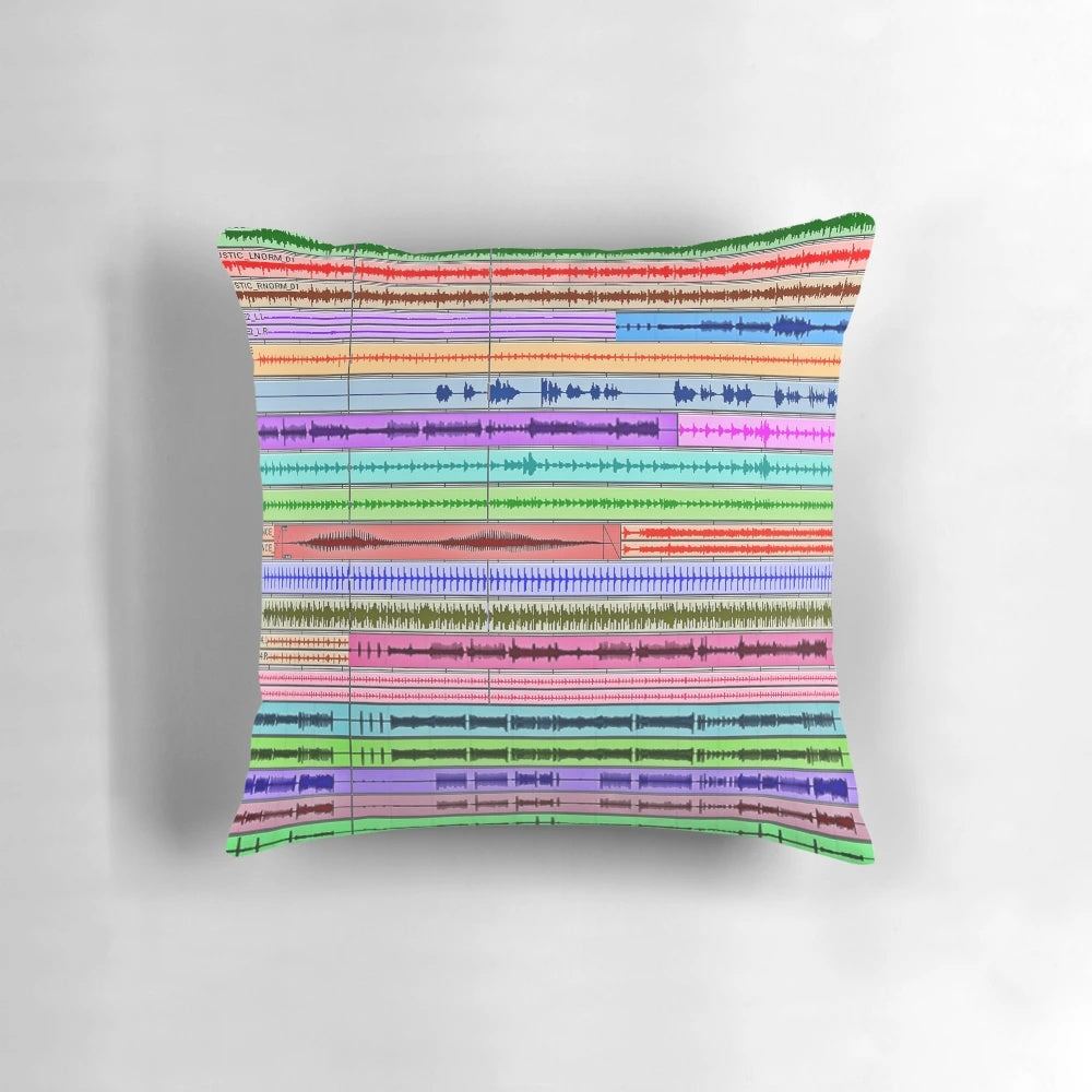 Colorful throw pillow featuring a creative design inspired by music production and audio engineering