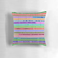 Colorful throw pillow featuring a creative design inspired by music production and audio engineering