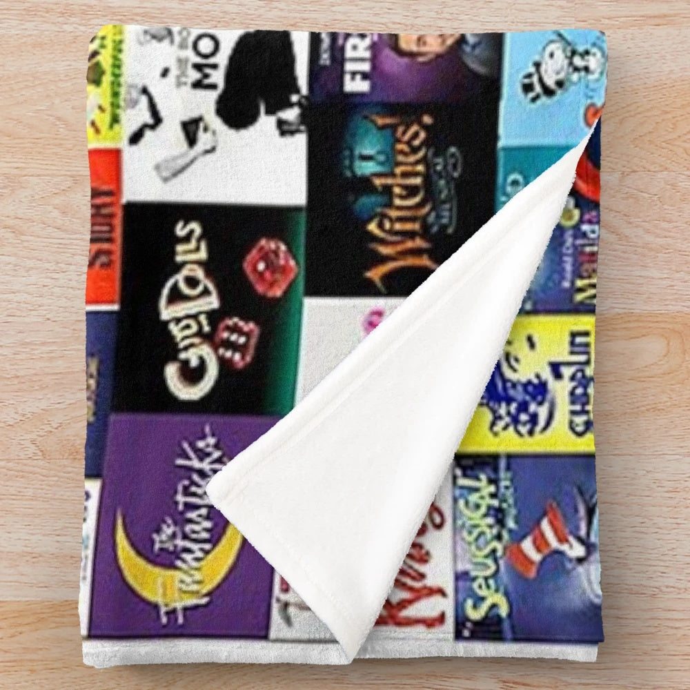 Plush blanket featuring a collage of Broadway and musical theater imagery