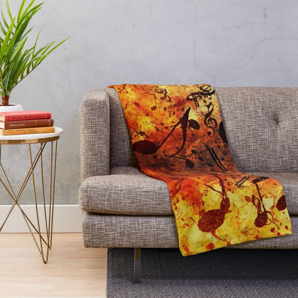 Colorful plush blanket featuring musical notes, clefs, and symbols