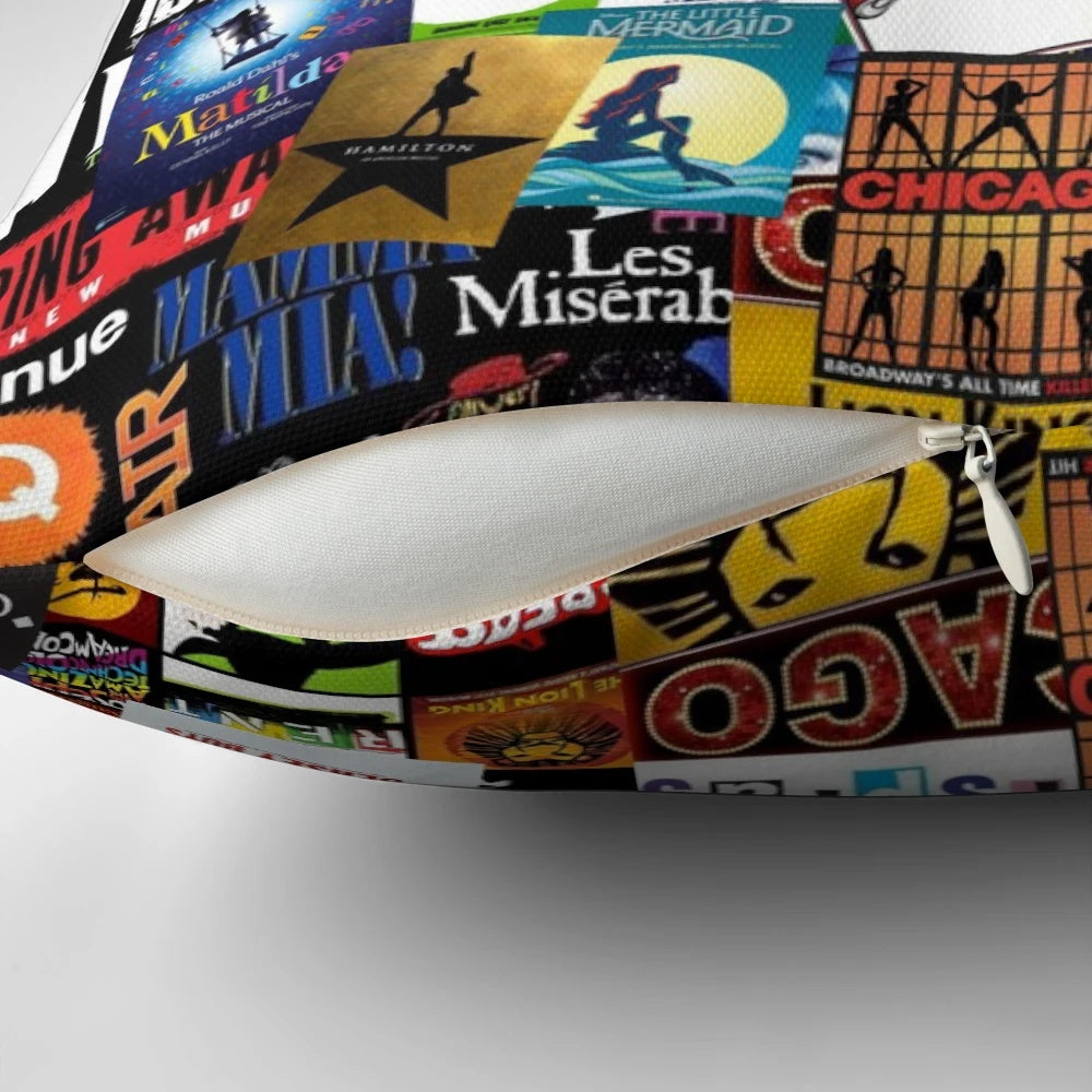 Colorful collage-style throw pillow featuring various musical theater imagery and text.