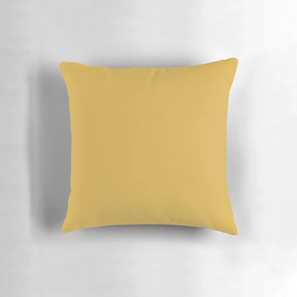 Mustard yellow decorative throw pillow with a vibrant, modern color and pattern